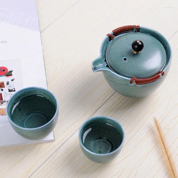 Juegos de té Creativo 1 olla 2 tazas Tetera de porcelana con infusor de acero inoxidable Hervidor de cerámica de viaje personal portátil Juego de té chino