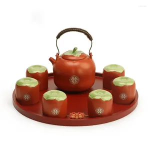 Juegos de té Cerámica creativa para el hogar Juego de tetera con forma de caqui Taza de té Ceremonia de tetera para suministros de boda rojos chinos Regalos de recuerdo