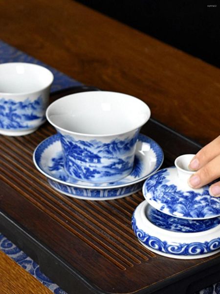 Juegos de té Jingdezhen, porcelana azul y blanca, cubierta de tres herraduras, prensa, taza de mano, juego de cuencos de té familiar grande, caja de regalo