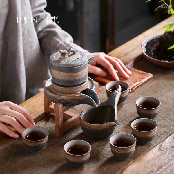 Ensembles de voiles de thé Pinny Gilt Stone Grinding Tea set Ceramic 8 Piece Gift Box Creative Semi -tingomatic Drinkware