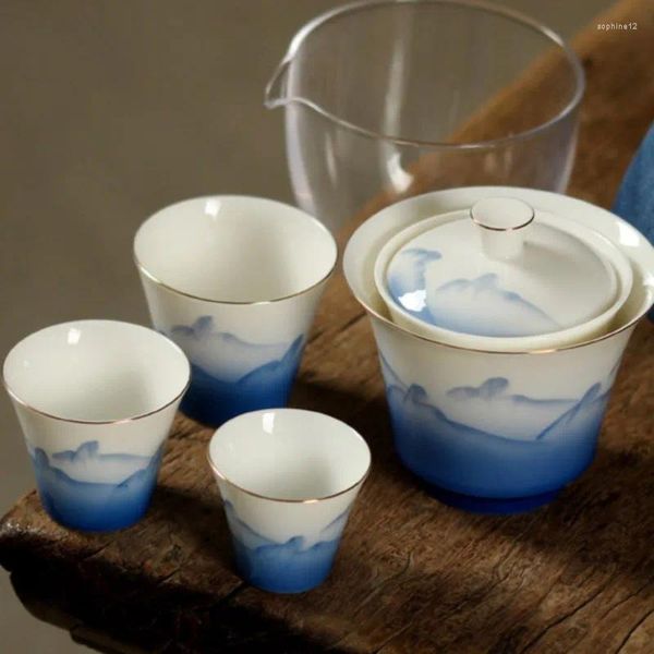 Juegos de té juego de té de viaje Jingdezhen pintado a mano una olla llena tres tazas cubierta de cerámica correa de reloj bolsa portátil taza con