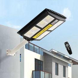 Varilla telescópica LED Luz de calle solar PIR Sensor de movimiento Lámpara de sincronización Control remoto Luz de pared todo en uno para Plaza Garden iluminación impermeable al aire libre