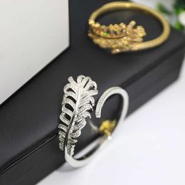 Temperamento moda lujo pulsera de plumas doradas marca de plata joyería de mujer AAA circón brilla romántico fiesta clásica St316U