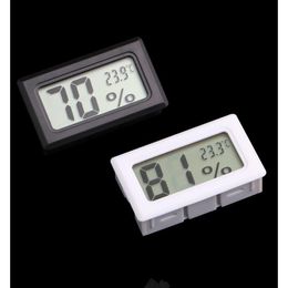 Instrumentos de temperatura Venta al por mayor Mini Negro Blanco Digital LCD Termómetro integrado Higrómetro Temperatura Medidor de humedad Gota interior DH4S9