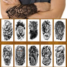 Tijdelijke tatoeages 100 stks Groothandel Tijdelijke Tattoo Sticker Leeuw Tijger Wolf Slang Bloem Zwart Lichaam Arm Nep Mouw Waterdicht Man Vrouwen 230701