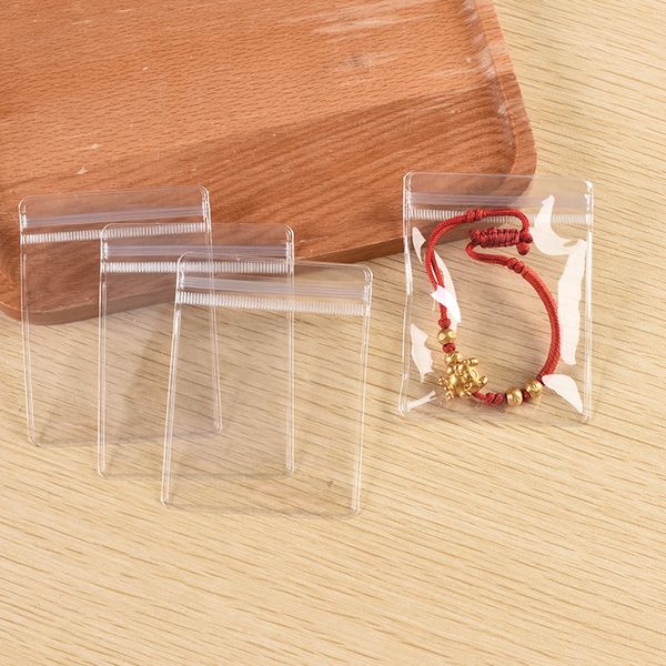 TETP 50pcs mini joyería de joyería empaquetado sellado de sellado bolsas ziplock bolsas al por mayor de PVC accesorio minorista pantalla a prueba de polvo