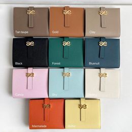 La billetera para mujeres hecha a mano de conejo más vendida de Tailandia portátil lindo bolso de moda múltiples tragamonedas de diseño de tarjetas de moda