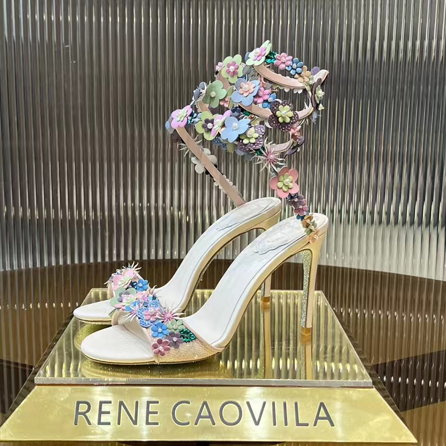 Den bästa Rene Caovilla High Heel Flower Decorative High Heel Sandals Women Fashion Snake Wrapped Ankle Strap Luxury Designer Wedding Shoes