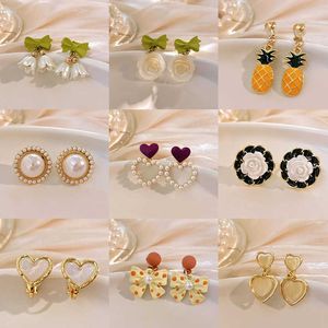 the Camellia Flower Ear Clips Stylish Acrylic Clip on Premium Pearl Earrings for Women Without Piercing Earholes Gifts
