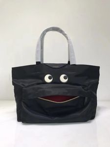 De klassieke smiley-boodschappentas is schattig en dezelfde draagtas met groot oog, reistas, canvas tas van koeienhuid 240106