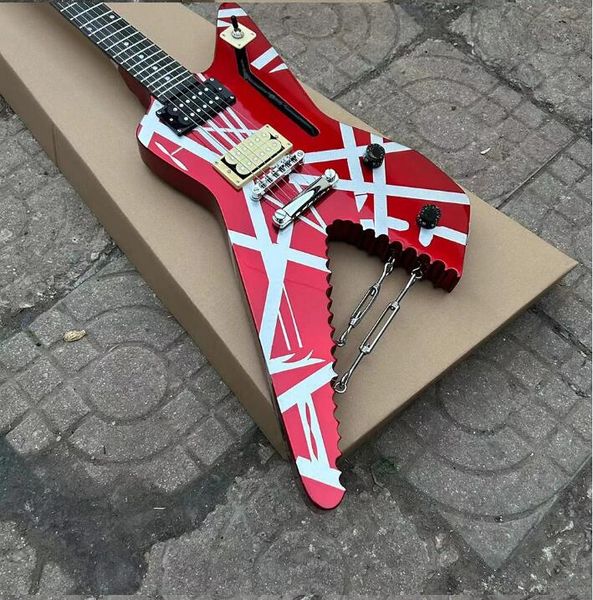 El E VH es lo mismo que la guitarra Eléctrica Stripes Shark con una velocidad de cuerda de punto tocando metal Van Halen