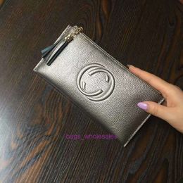 Le sac à main du sac d'usine 2017 portefeuille en cuir ultra-mince simple tassel tassel à glissière Soft Cowhide Handbag Nouveau style
