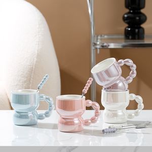 La dernière tasse à café en céramique Pearl de 10,2 oz avec une cuillère, de nombreux choix de style, support la personnalisation de tout logo