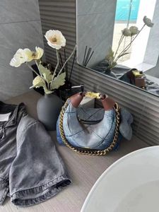 Le dernier sac en denim de couleur délavée de créateur de niche Crescent Cloud sac à bandoulière à la mode