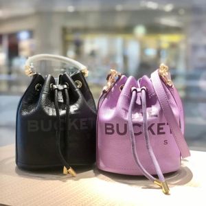 de micro bucket bag M schouder luxe M drum handtassen trekkoord treksluiting touw handvat handtas crossbody bakken tassen portemonnees portemonnee