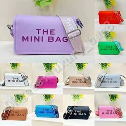 Los mini bolsos de diseñador de bolsas Bolsos de hombro Bolsas de hombro Crossbody Bag Men Mini Handbag New Tote Classic Popular Fashion Wallet Passport Pasaporte de alta calidad