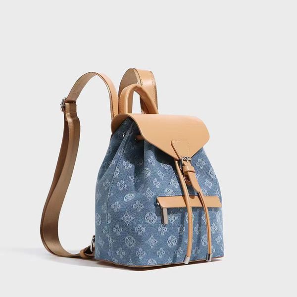 Le nouveau sac à dos floral en denim est un mini sac à dos élégant 22*27*13