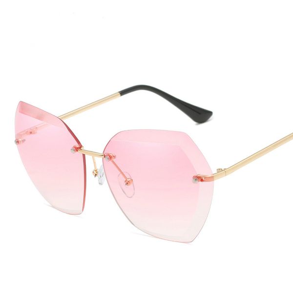 Las nuevas gafas de sol de moda europeas y americanas, gafas sin montura, gafas de sol de metal UV400, gafas de sol femeninas al por mayor