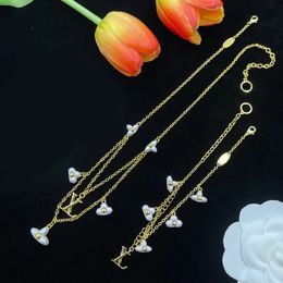 La nouvelle mode collier en or 18 carats bracelet à breloques pour femmes ensemble de bijoux de créateur pour accessoire de cadeaux de fiançailles de fête de mariage