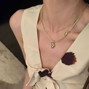 De nieuwe Koreaanse versie van de Franse unieke cowhorn -tas dubbel gelaagde ketting voor dames Instagram licht luxe ontwerp sense niche sieraden gevoel van luxe