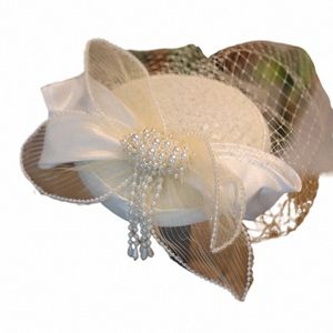 Le nouveau style de style Sen Beau Bowknot perle Pichet Net Hat Hat Bridal Wedding échantillon photo de voyage et modélisation de maquillage T3G1 #