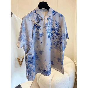 Le nouveau haut d'été est super beau en 2023 avec un tempérament haut de gamme. Chemise boutonnée imprimée de style chinois, vêtements pour femmes, nouvelle collection