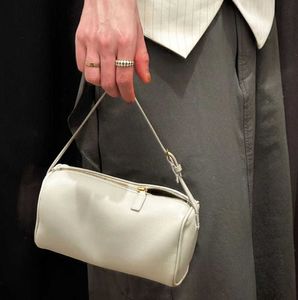 Le concepteur de sacs en rangée en daim baisse des années 90 Mini simple sac à main simple en cuir féminin européen et américain