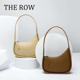Le sac de ligne Moon Half Women Light Luxury Design de haute qualité en cuir authentique One épaule Cross Cross Hands Mands Sac à main Nouveau style