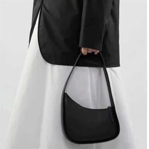 Le sac en rangée le sac Half Moon a conçu des femmes en été en été de haute qualité en cuir Kendou en cuir One épaule avec le même style 247w