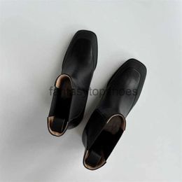 The Row Boots Tr Dress Women Shoes Chaussures de femmes Chaussures Rois Lycra Splice Cowhide Sleeve Short Tube Flat Bottom Botch Boots High Version Taille 2024