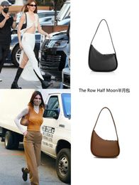 Le sac Row Half Moon en cuir lisse de luxe pour femmes sacs de créateurs bandoulière courbée fermeture à glissière sous les bras sac à main avec boîte