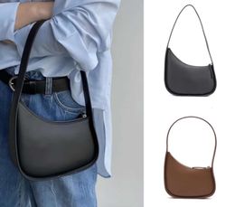 The Row Half Moon Sac en cuir véritable conçu par une niche Style minimaliste Kendou Même style Une épaule sous les bras Sac à main en cuir véritable Femme La marée