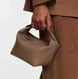 The Row Head Layer Pelle bovina Primavera/Estate Design popolare Premium Texture Lunch Box Borsa a secchiello Borsa da donna in pelle