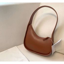 Le sac à main en cuir en cuir Half Moon fourre-tout