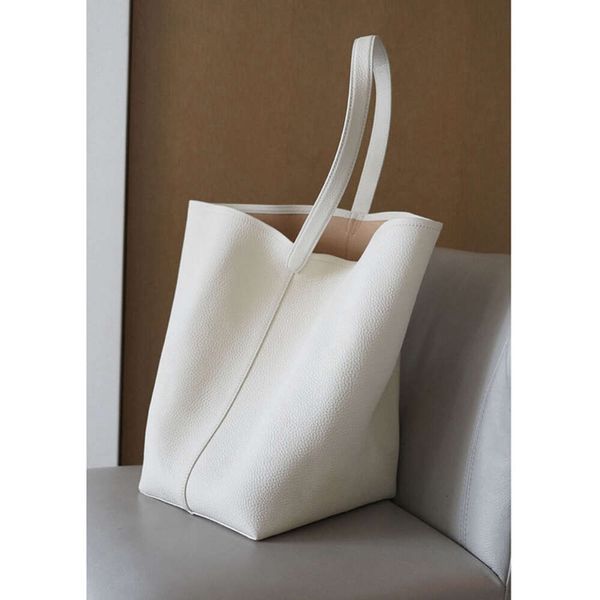 Le sac de seau de luxe Light Row est simple et de grande capacité sac fourre-tout une couche supérieure de cuve de vache et un sac à main pour les femmes de haute qualité