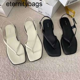 The Row the * Row Summer Genuine Leather Square Head Clamping Sandals Fashion and Casual Plack Beach Flat Bottom Muller Chaussures pour femmes