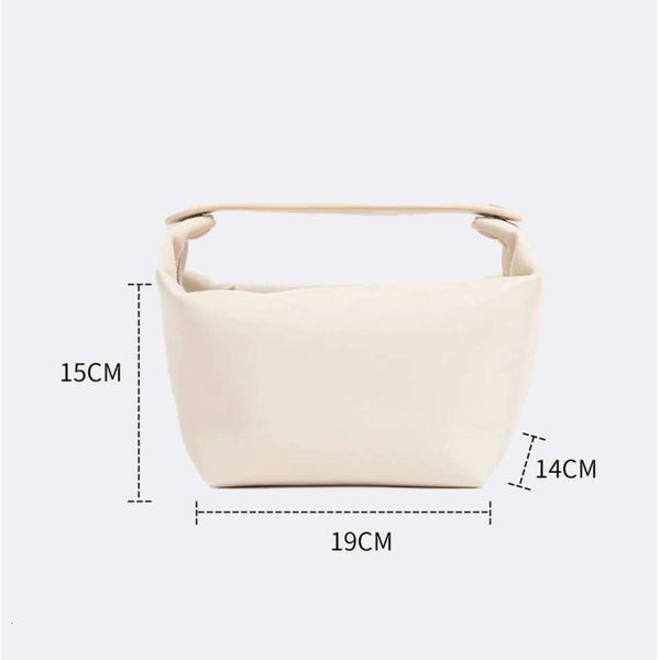 Les lignes Top Layer Cow Hide Niche Design Texture haut de gamme Boîte à lunch en cuir authentique Sac sous bras portable Bodet d'eau Sac Womens C26X