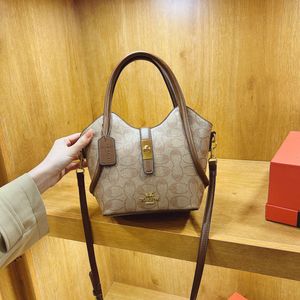 Le magasin exporte des sacs de créateurs en gros sac de boutique haut de gamme pour femmes 2024 Nouveau sac à main imprimé décontracté et polyvalent épaule à bandoulière