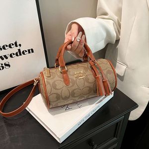 Le magasin exporte des sacs de créateurs en gros Boston nouveau sac d'oreiller léger texture de luxe femmes grande capacité une épaule bandoulière haute qualité sac à main à la mode