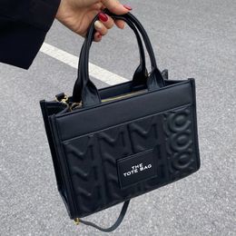 le sac fourre-tout MJ logo Sacs de créateurs Toile Marc Sac à bandoulière Sac à bandoulière Poignée Single Totes Sac de créateur Femme Casual Fashion Sh238K