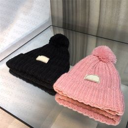 Espesar gorros cálidos sin ala sombreros de color sólido diseñador de letras estilo casual sombrero hombres mujeres bola tapa superior