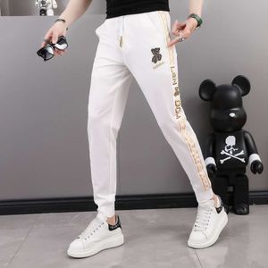 Pantalones deportivos blancos delgados 2022 para pantalones casuales para hombres New Tendy marca ajustada Fit de secado rápido para hombres Pantalones sanitarios