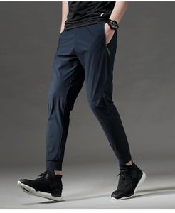 Pantalon de survêtement en entraînement mince s'adapter à des joggeurs confortables à sec rapidement des hommes coulant pantalon long gymnase sportive pantalon zip poche 7620818