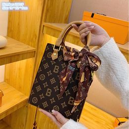 Bolso de hombro para mujer al por mayor de fábrica Bolso clásico con estampado de color antiguo Letras populares de este año Monedero para teléfono móvil para mujer Bolsos elegantes con cinta de lazo