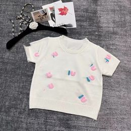 T-shirt à manches courtes en tricot avec alphabet floqué rose en trois dimensions Pull à col rond pour femme Manches bouffantes Demi-manches Pull simple pour fille chaude