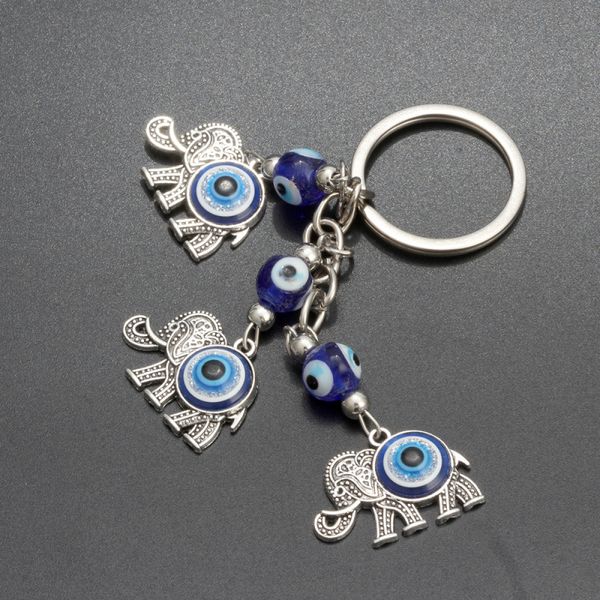 Porte-clés porte-clés porte-clés en alliage de zinc plaqué argent antique avec trois éléphants chanceux bleu mauvais œil