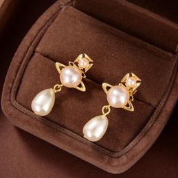 Trois perles suspendues célébrité femme boucles d'oreilles Stud Western reine planète étoile aura haute qualité bijoux de luxe femmes Saturn boucle d'oreille concepteur bijoux cadeaux ER568