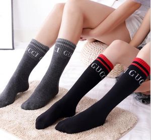 Tide herfst nieuwe snoepkleur letterstapel vrouwelijke sokken modetrend veelkleurige wilde katoenen sokken 7 kleuren2910624