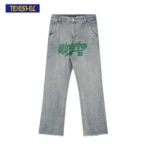 Tideshec Brodé Raw Edge Flare Jeans Hommes / Femmes Taille Haute Lettre Pantalon Streetwear Hip Hop Large Jambe Denim Pantalon Évasé 211009