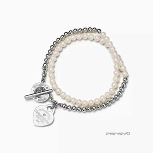 Tiffanyanynecklace Classique 925 en argent sterling OT boucle couche perle pendentif en forme de coeur avec collier de diamant pour les femmes
